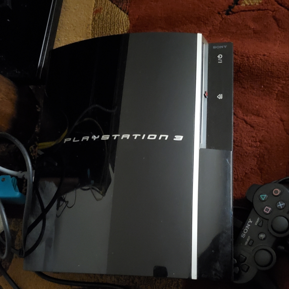 Used playstation 3 w/ controller